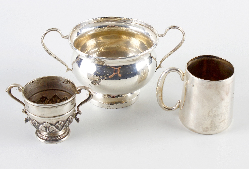 A small selection of silver items, to include an early 20th century christening mug, of tapered