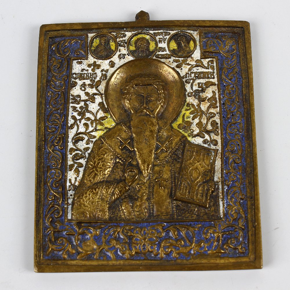 A 19th century enamelled bronze Orthodox icon. Greek or Russian, cast in relief with a bearded saint