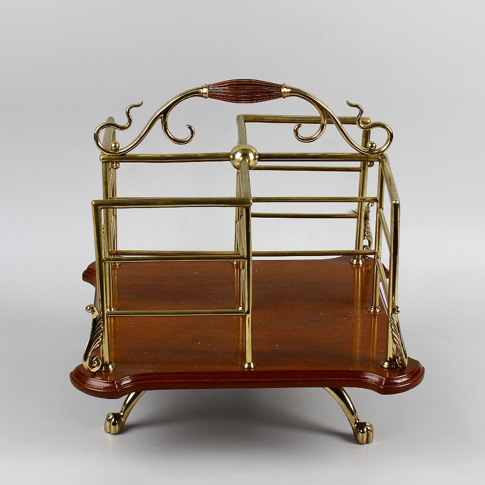 A Victorian Arts and Crafts revolving table bookstand. In the manner of WAS Benson, of square form