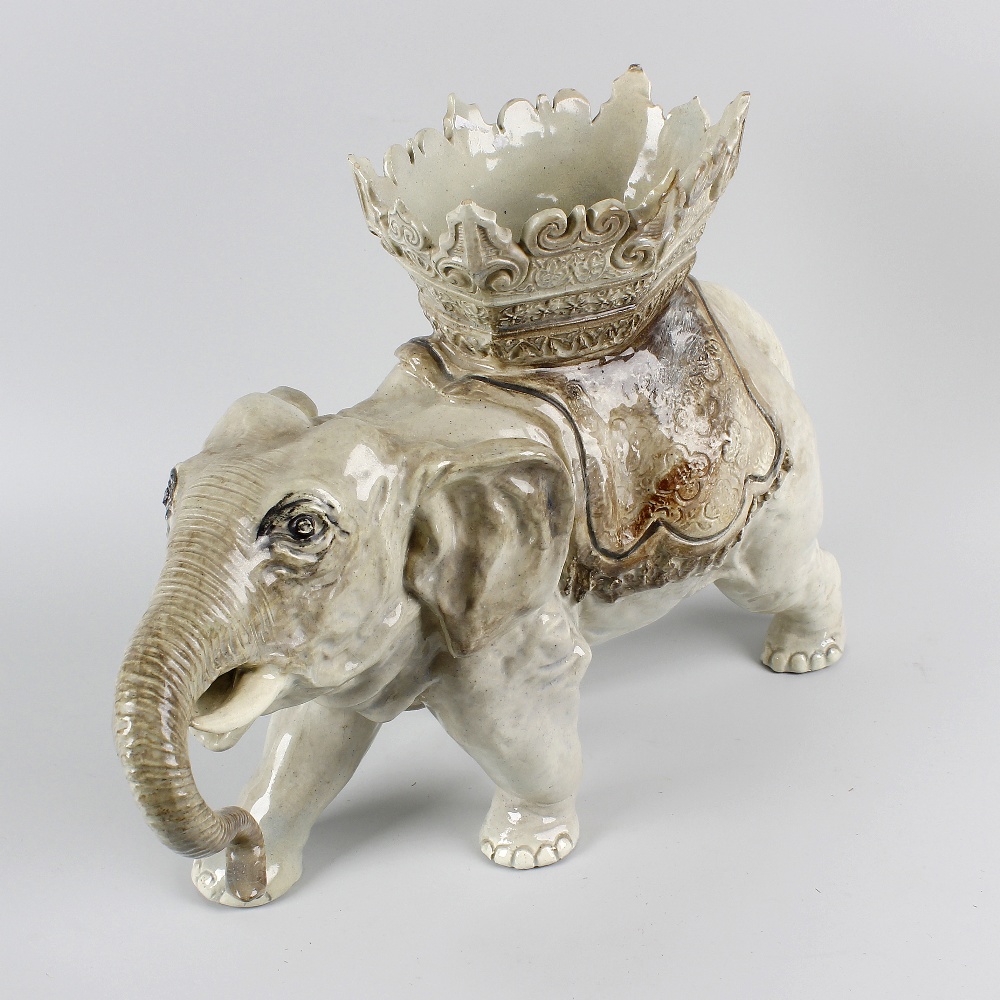 Four ceramic items Comprising: a pottery elephant, German or Austrian, 17 long x 12 high, (43cm x