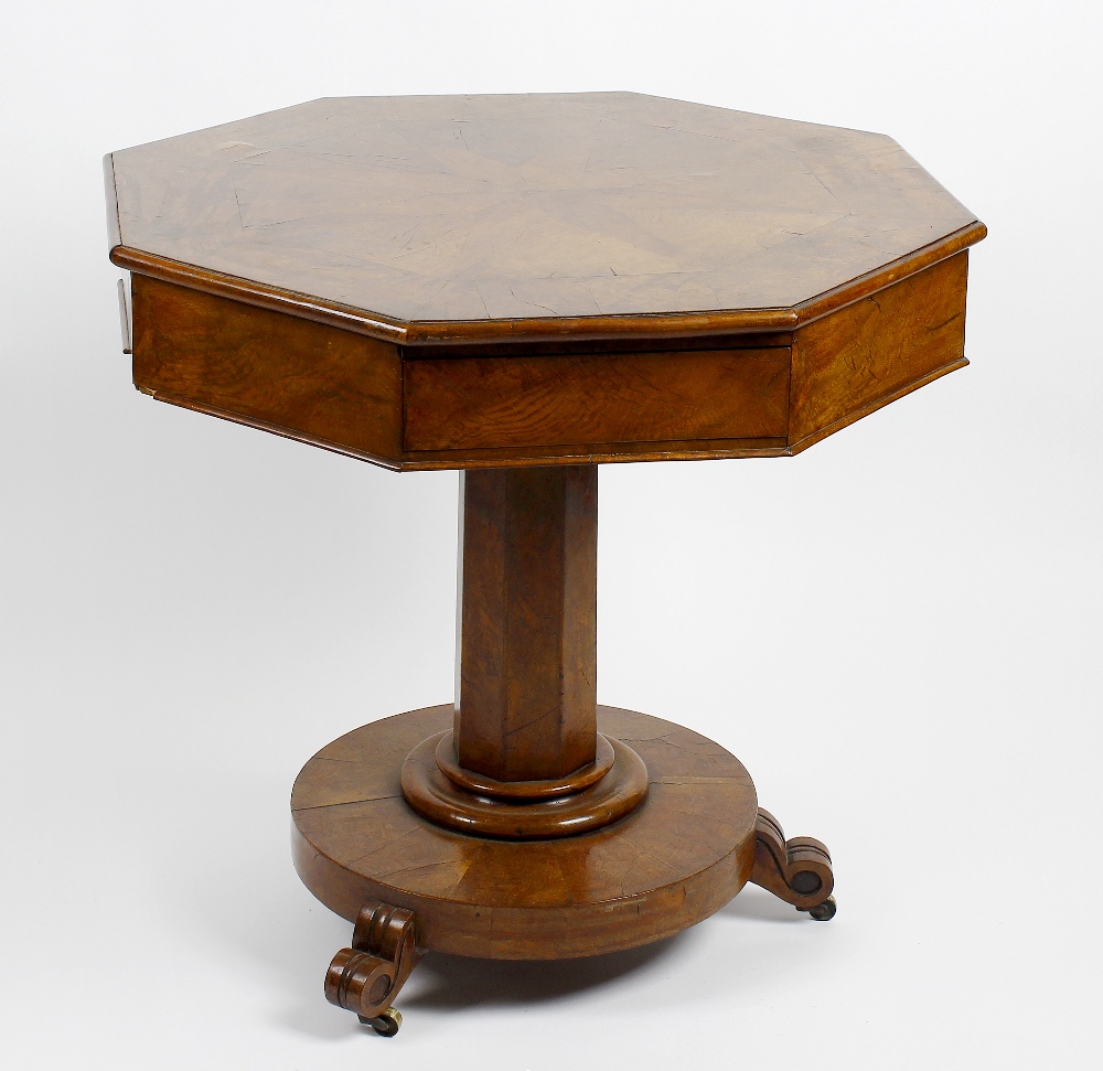 A mid 19th century pollard oak centre drum table The segmented octagonal top with star inlay over