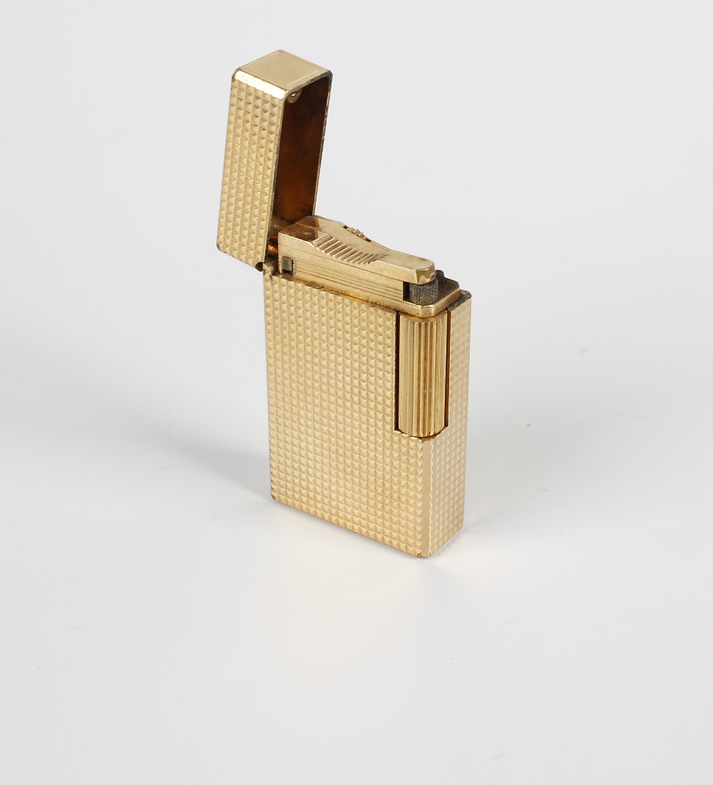Dupont - a gold-plated cigarette lighter, 7628EA, of textured rectangular form, 2.25, (5.5cm) - Image 2 of 2