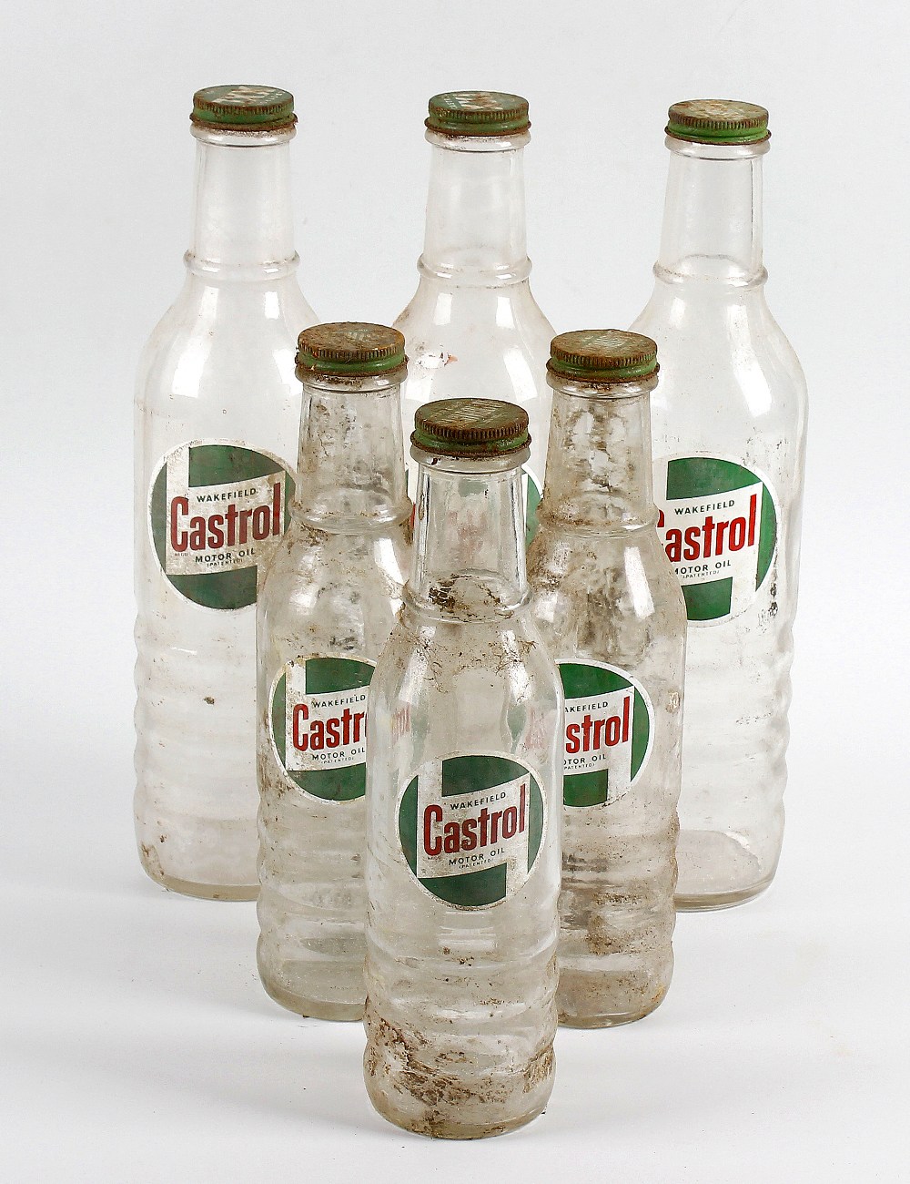 A collection of 21 assorted Castrol motor oil glass bottles. Comprising seven large (XXL, XL and