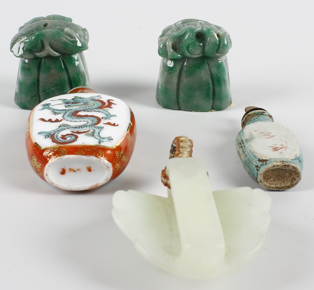 A pair of dyed Jade scroll weights, a carved jade buckle modelled as the face of a demon 2.25 5. - Image 2 of 2