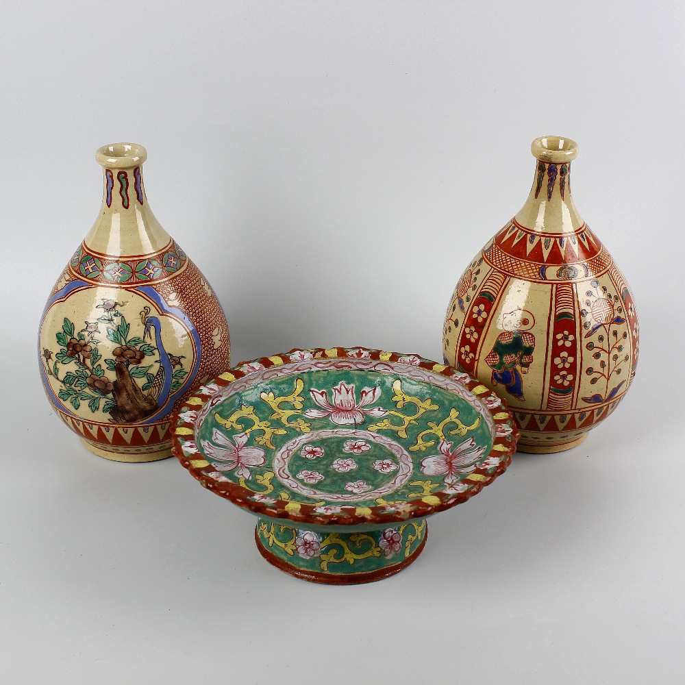 A group of Japanese ceramics. To include a pair of pottery vases, each of bulbous form, one