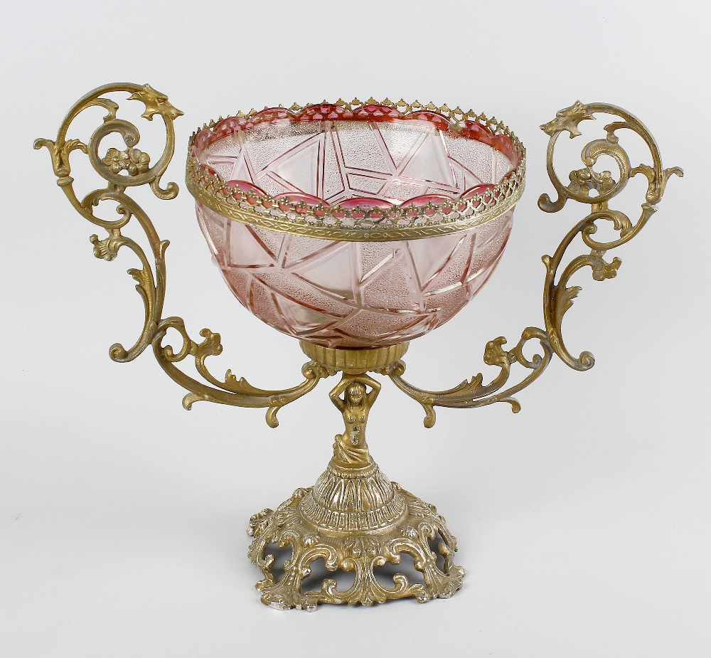 A coloured glass mounted centrepiece. The pink cut glass bowl having a lobed rim with plain and