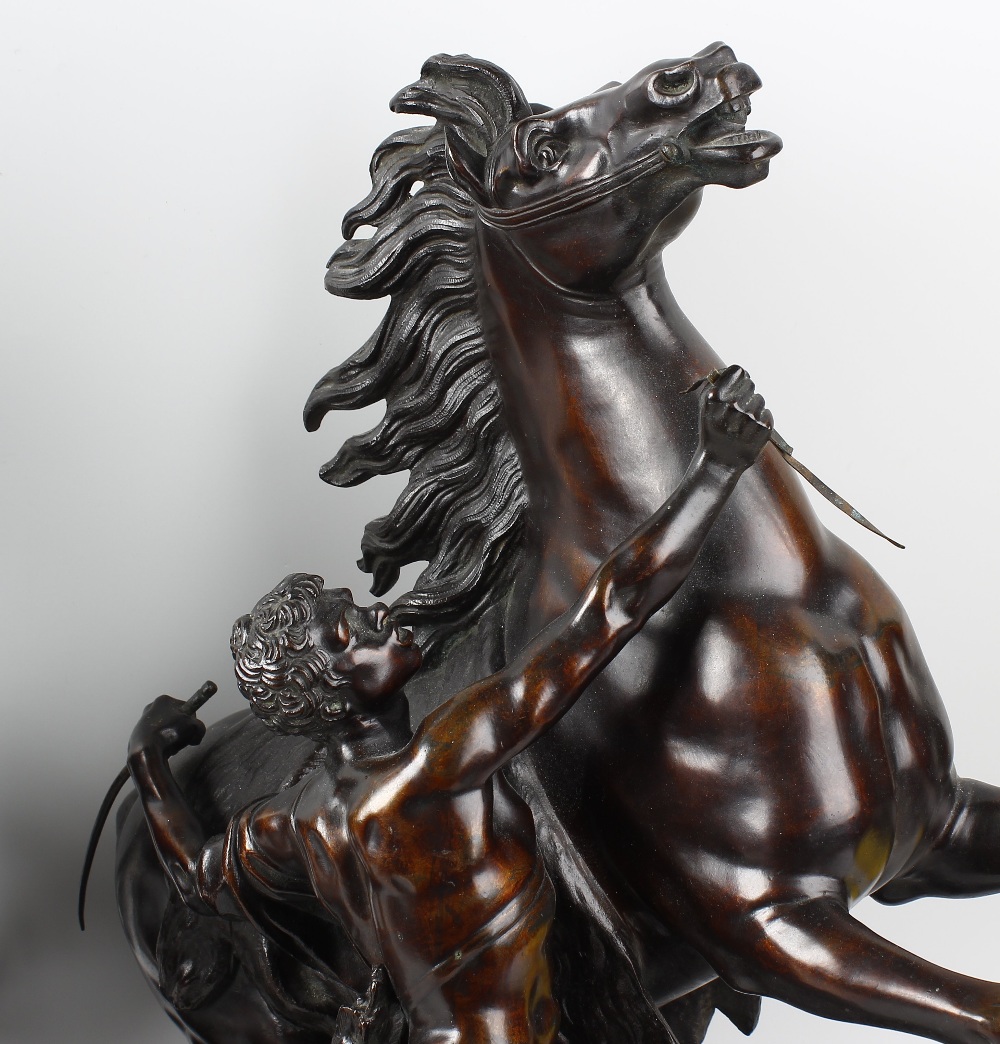 A pair of 19th century bronze Marly horses In the manner of Coustou, each rearing horse with - Image 4 of 5