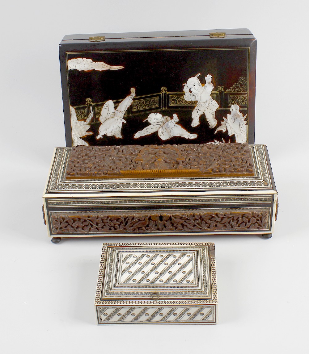 A box containing a mixed selection of Eastern boxes. To include a black lacquered jewellery box