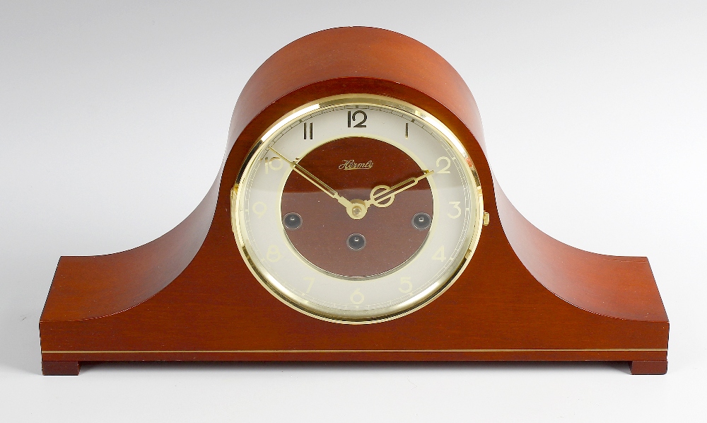 A modern Hermle 'Napoleon's hat' chiming mantel clock. The cream Arabic chapter ring, within