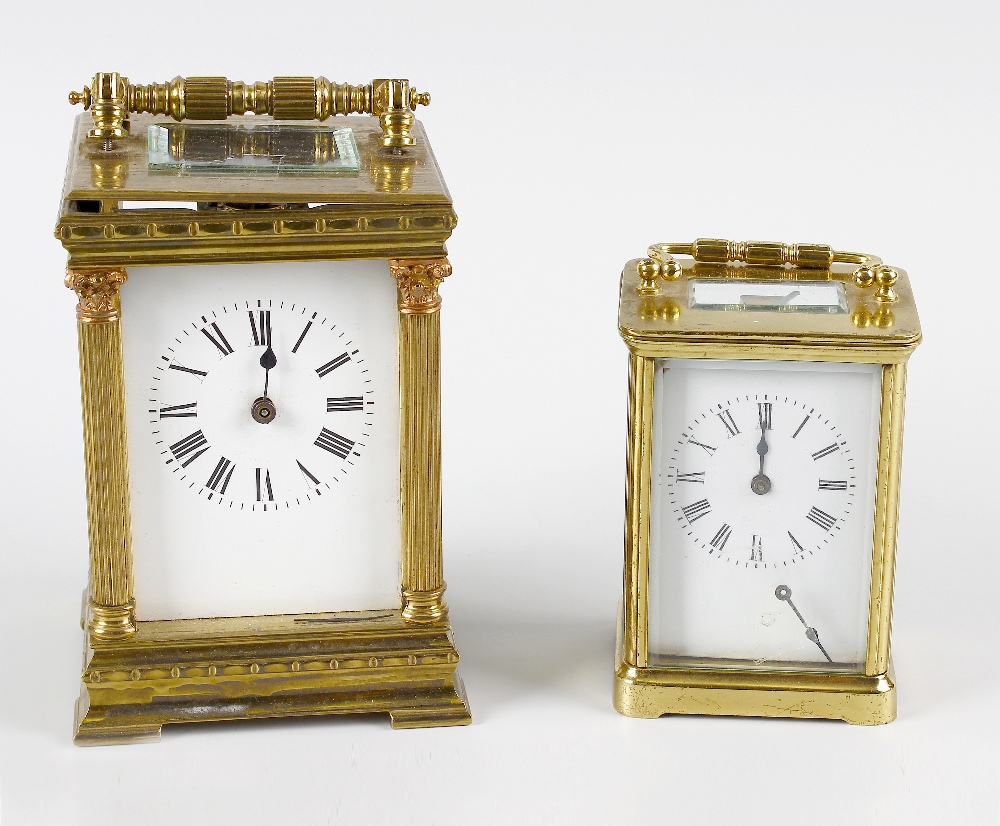 Two brass carriage clocks to restore. Comprising: An Anglaise-cased example with two train