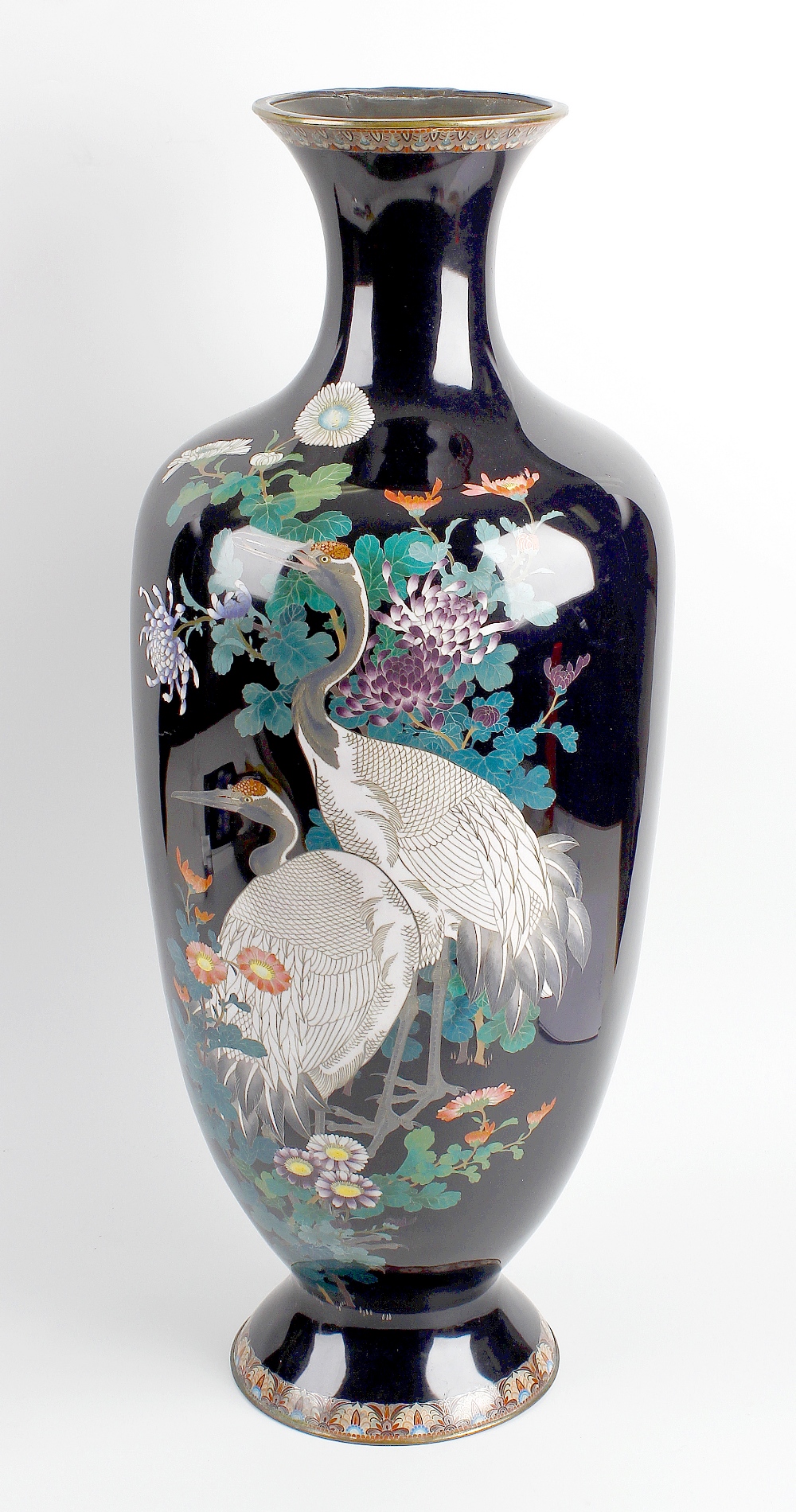 A good large Japanese Meiji period cloisonne vase. Of ovoid form with tall flared neck and footed