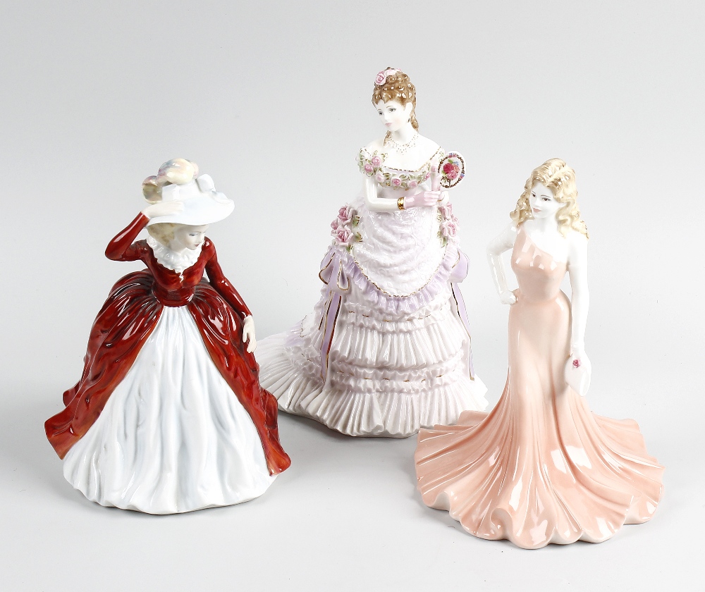 A group of Doulton, Coalport and Worcester figures. Comprising four Coalport ladies, including '