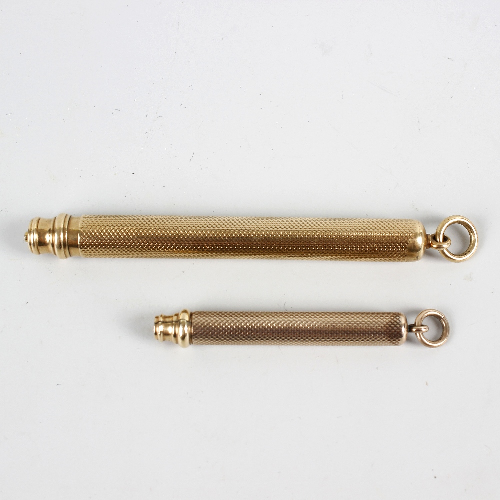 A 9ct gold propelling pencil by Sampson Mordan. With engine-turned cylindrical barrel, hallmarked