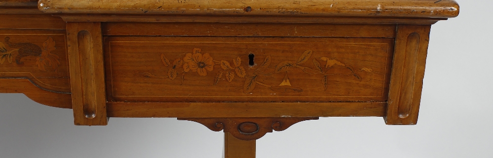 A mid 19th century inlaid satinwood library or centre table. The moulded oblong top with inverted - Image 2 of 4