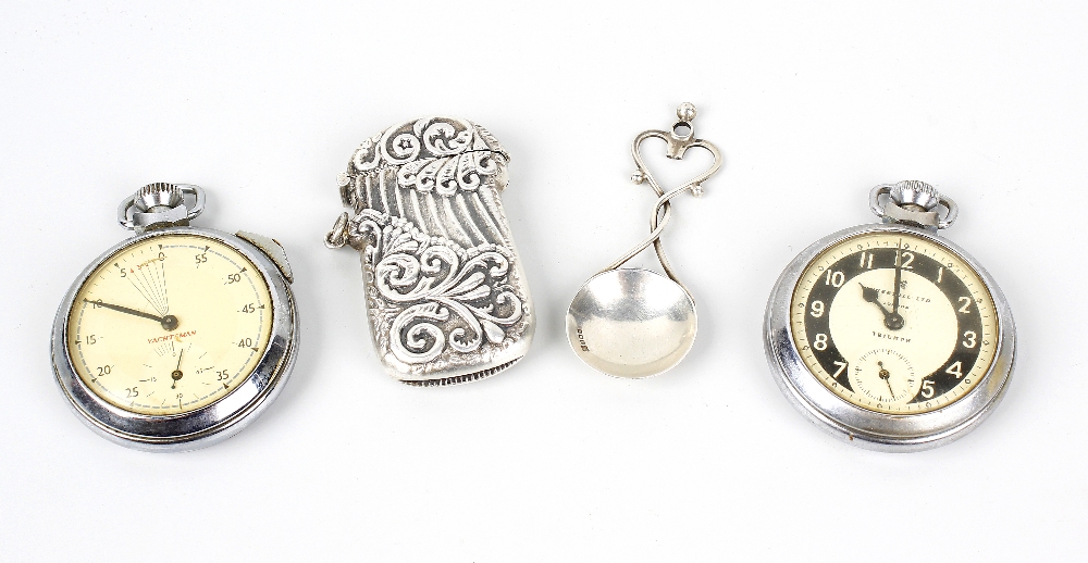 A Vesta case of shaped form with embossed shell and scroll decoration, impressed sterling 925, 2.