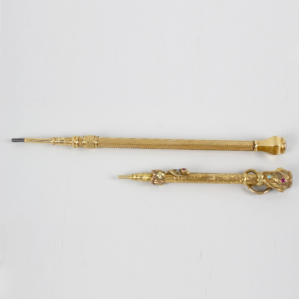 Two yellow metal and gem set Sampson Mordan & Co. retractable pencils. The first having foliate