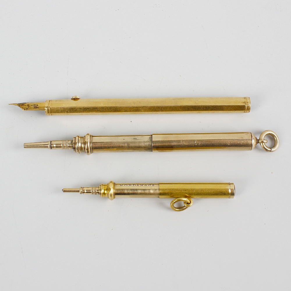 Two yellow metal Sampson Mordan & Co. retractable pencils, each of plain telescopic form, each