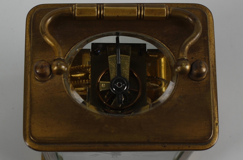 A late 19th century brass cased carriage clock. The 2 inch white dial with black Roman numerals - Image 5 of 5