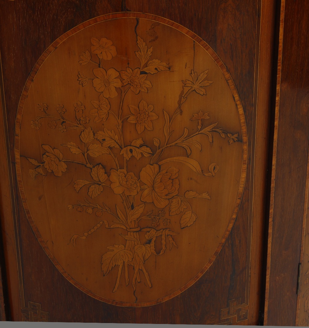 An early 20th century floor standing corner cabinet. The front with curved panelled door, inlaid - Image 2 of 3