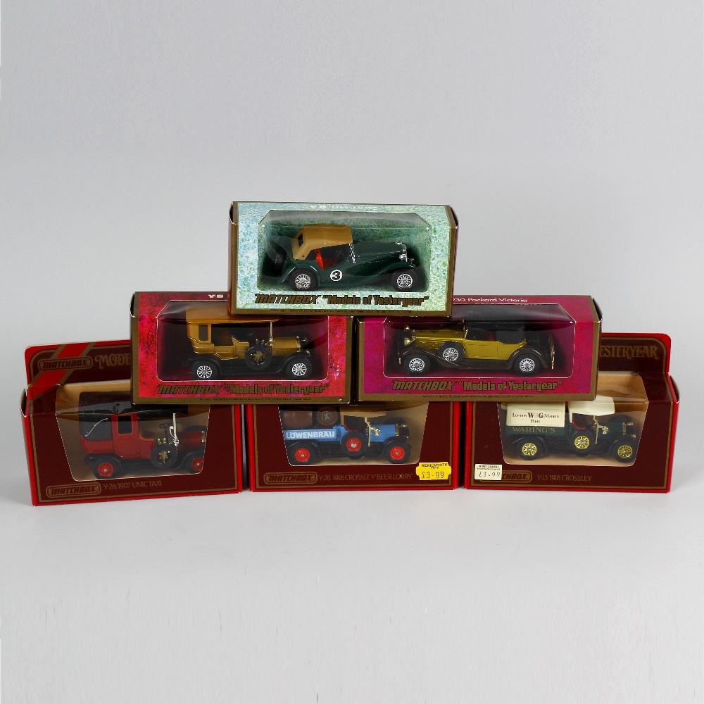 A box containing 50 Matchbox Models of Yesteryear diecast model cars and other vehicles, each in