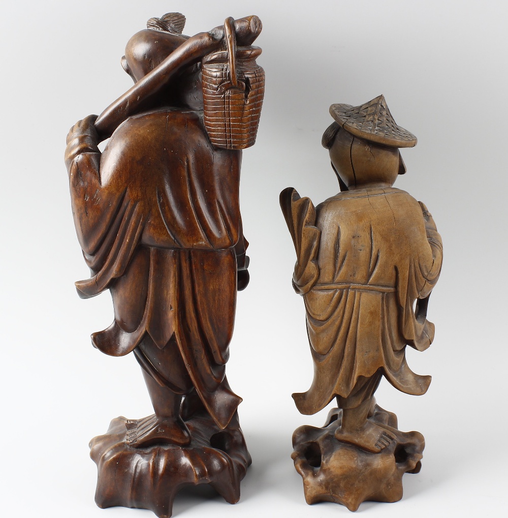 Two Japanese rootwood figures Each modelled as a fisherman with creel and fish, 14 and 11.5 high - Image 2 of 2