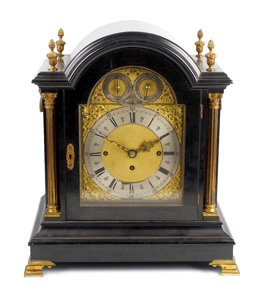 A good late 19th century ebonised triple fusee bracket or table clock The 8-inch arched brass dial