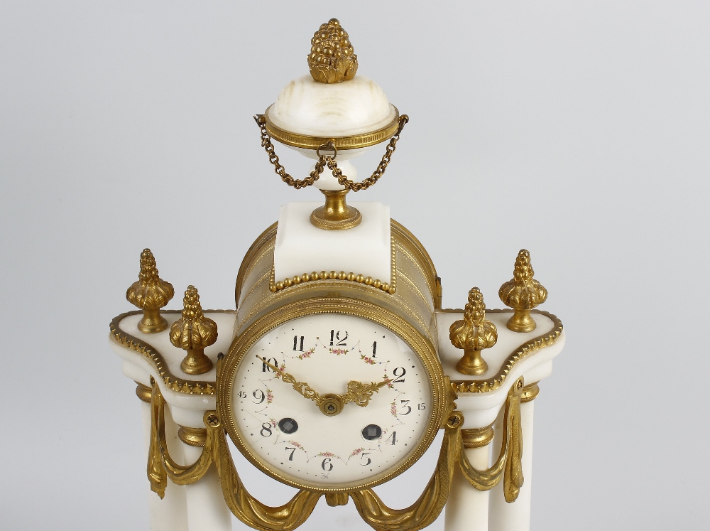 A French portico clock garniture. The white enamelled dial having Arabic numerals and floral swag - Image 2 of 2