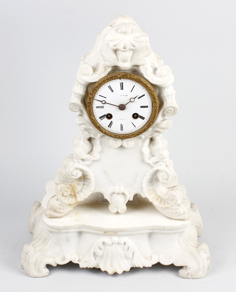 A French white marble clock and stand The 3.25-inch white Roman dial inscribed with Versailles