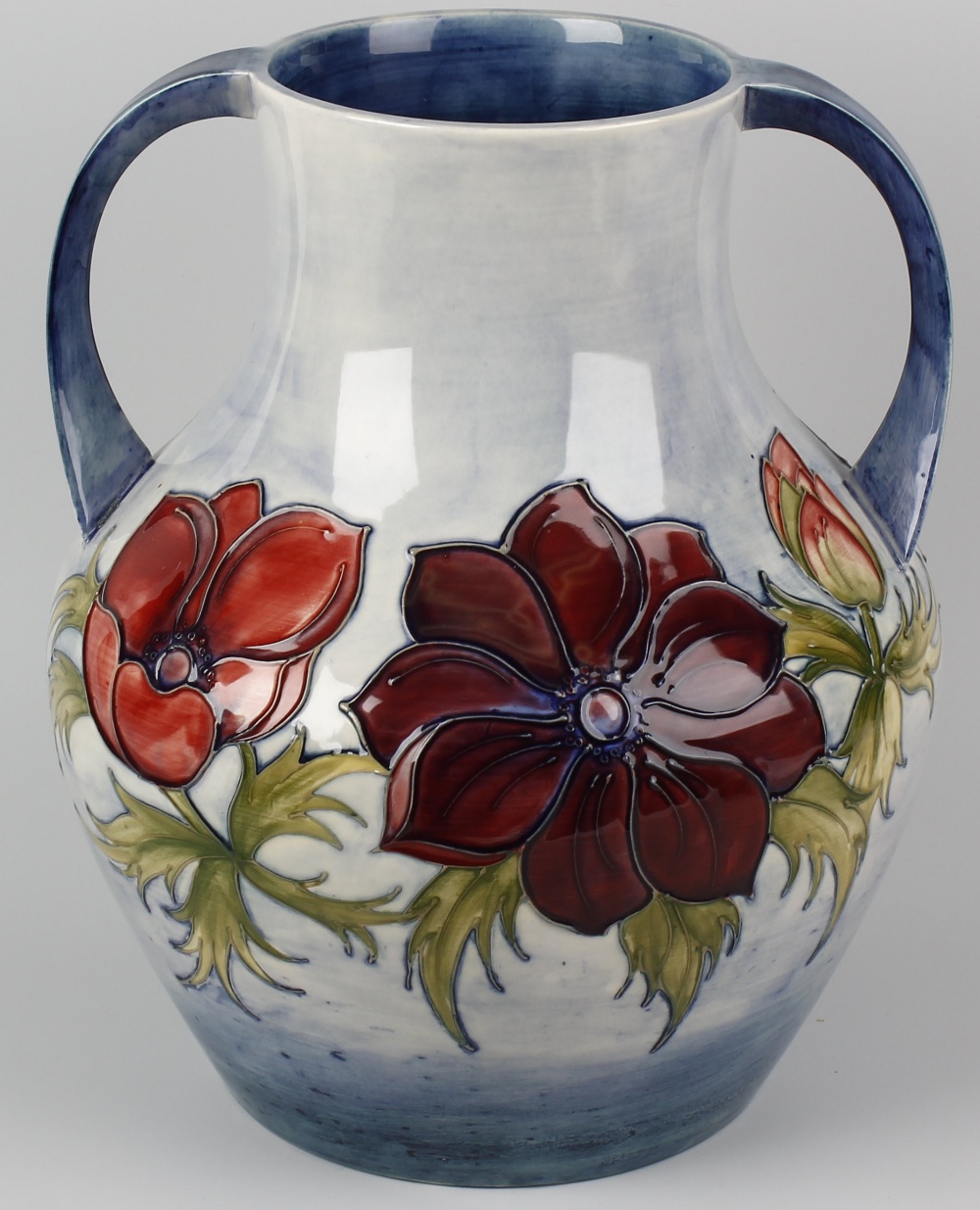 A large Moorcroft 'Anemone' pattern two-handled vase. Of bulbous form with tube-lined decoration - Image 2 of 3