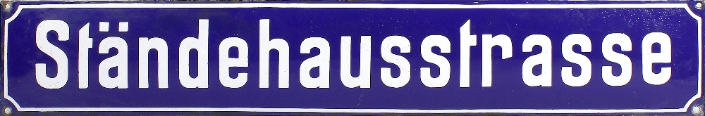 A group of German enamel street signs Each with white lettering on rectangular white-bordered blue