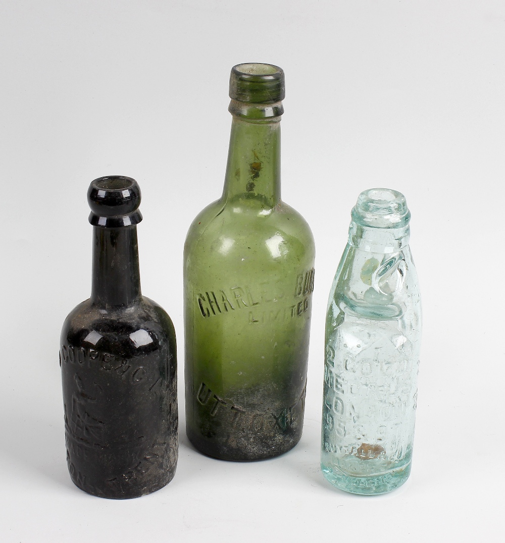 A box containing a collection of assorted glass bottles Staffordshire interest, to include