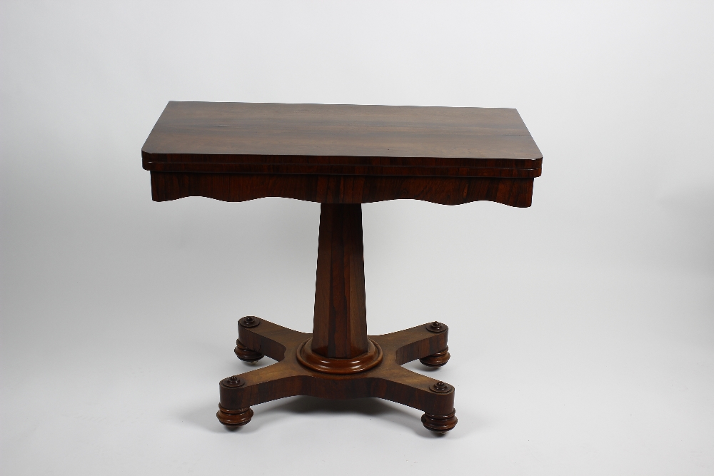 An early Victorian rosewood fold-over pedestal card table. The rounded oblong top enclosing a - Image 2 of 2