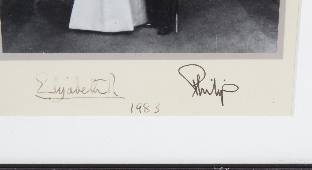 A black and white photographic print of Queen Elizabeth and Prince Phillip Ink signatures beneath - Image 2 of 3