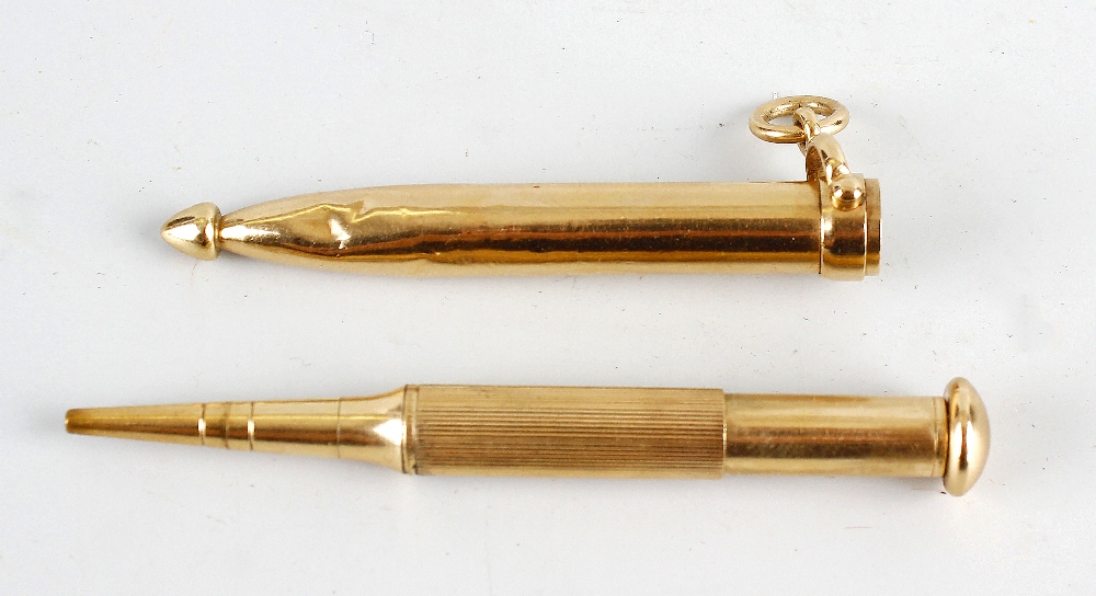 A Sampson Mordan & Co. 9ct gold propelling pencil, the ribbed barrel with domed terminal, within