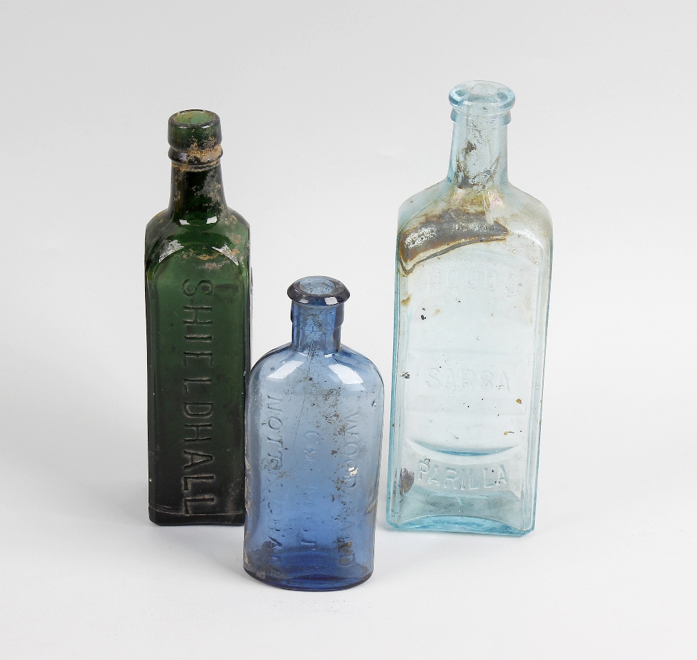 Two boxes containing a large collection of assorted glass bottles To include apothecary examples