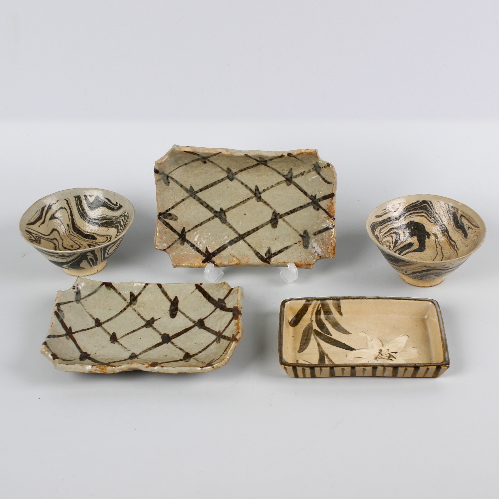A group of Japanese studio pottery. To include six agate ware bowls, a square serving platter, and