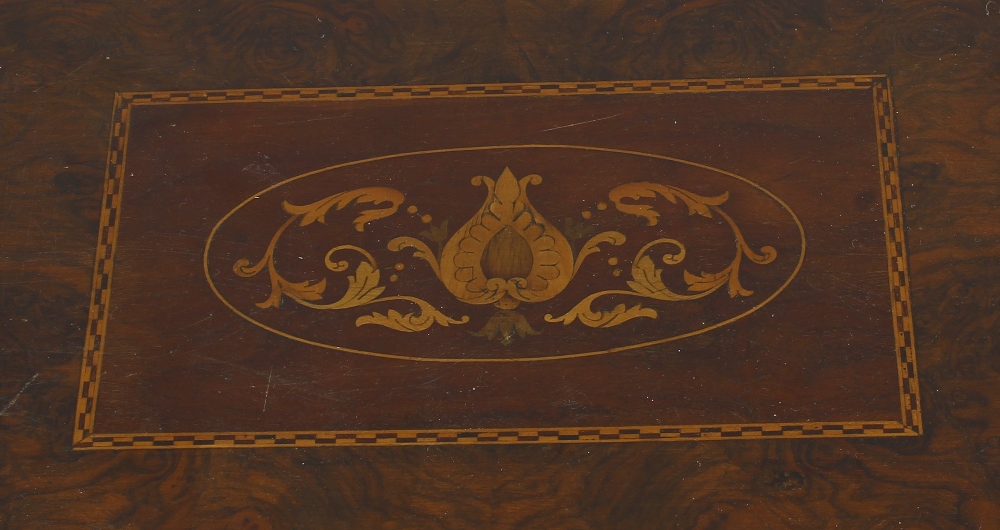 A mid Victorian inlaid walnut fold over games/work table. the figured quarter veneered top with - Image 3 of 4
