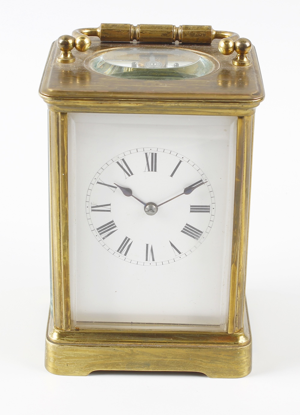 A brass cornice cased carriage clock with white Roman dial, the replaced leaver platform