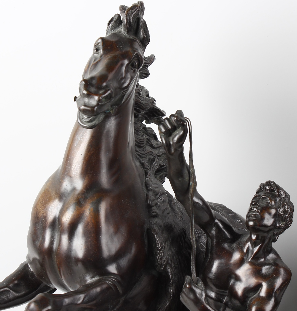 A pair of 19th century bronze Marly horses In the manner of Coustou, each rearing horse with - Image 3 of 5