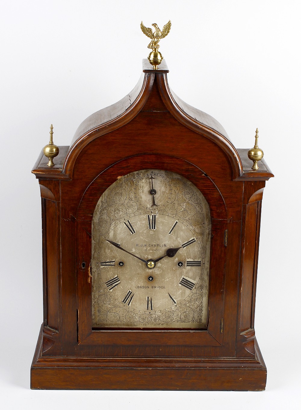 A mid Victorian oak-cased triple fusee bracket or table clock R. J. H. Chaplin, Arcade, London