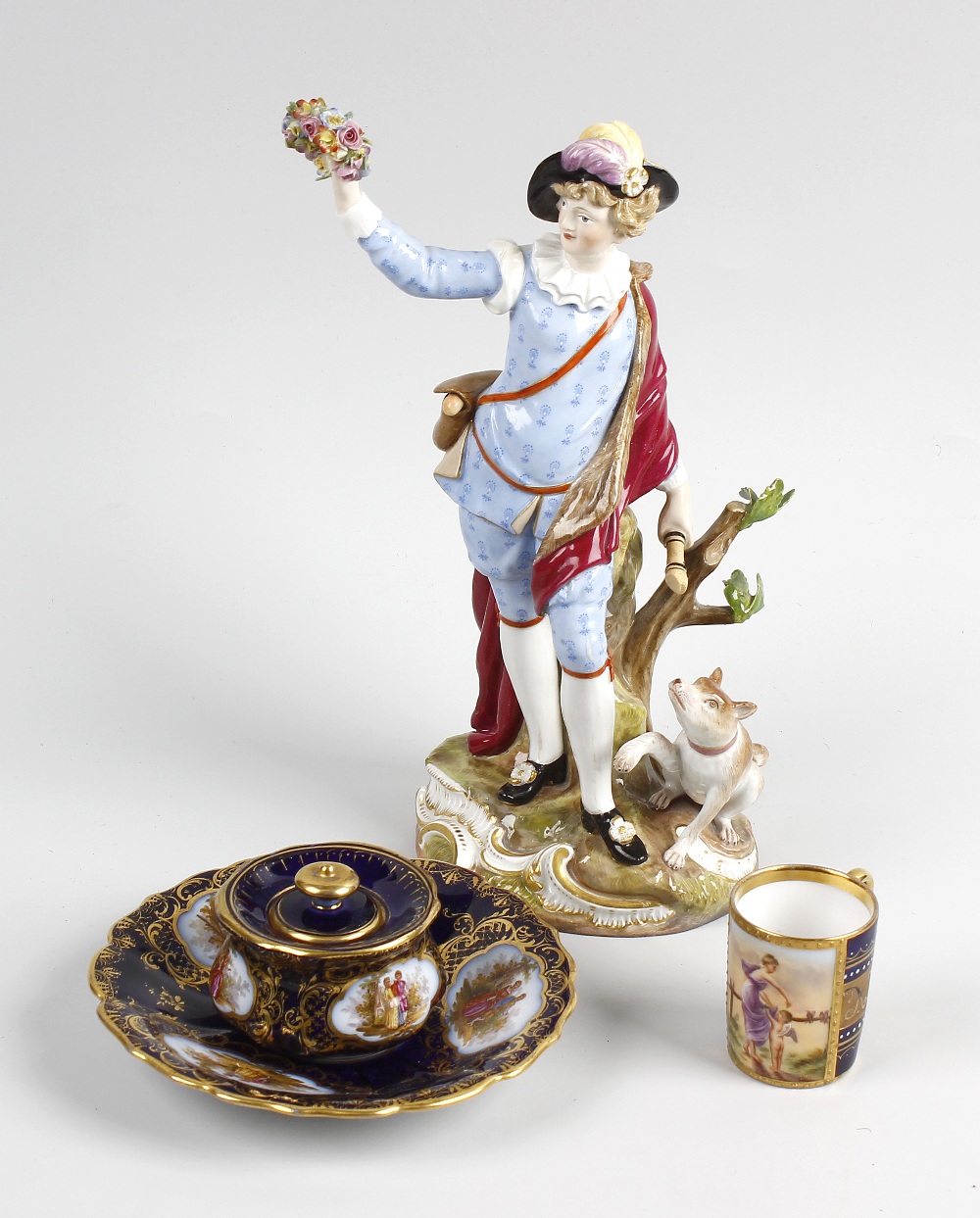 A box of ceramics. To include a Meissen/Dresden figure with dog, Vienna miniature cabinet mug,