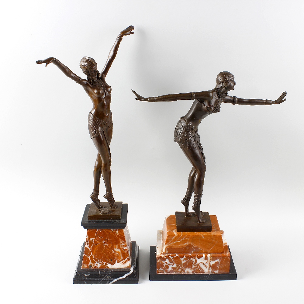 Two large reproduction Art Deco style bronze figures of dancers. In the manner of Chiparus, both