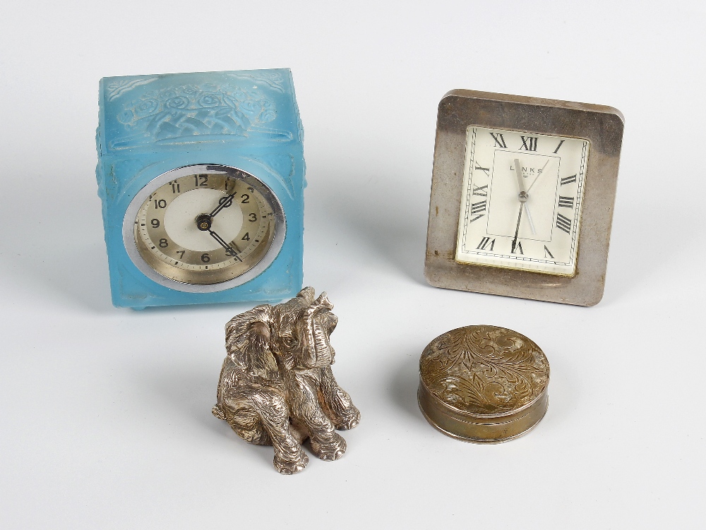 A box containing assorted collectables To include a selection of travel and desk clocks, treen