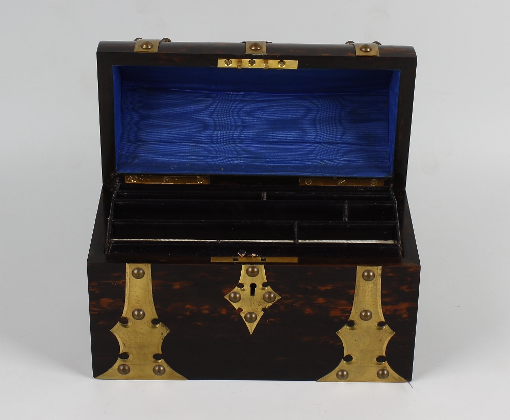 A coromandel stationary box. Having plain brass strap work to the exterior, the lancet arched hinged - Image 2 of 2