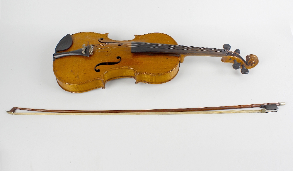 An early 20th century inlaid violin. The reverse having mother-of-pearl inlaid interlocking motif,