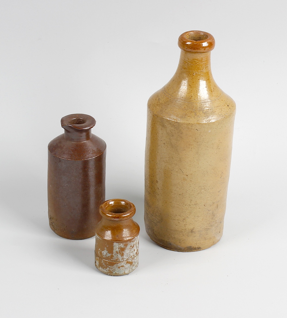 Two boxes containing a large collection of assorted stoneware bottles and jars To include brown