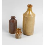 Two boxes containing a large collection of assorted stoneware bottles and jars To include brown
