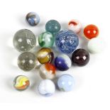 A case containing almost 300 marbles. To include onion skins, swirls, cats eyes and plain