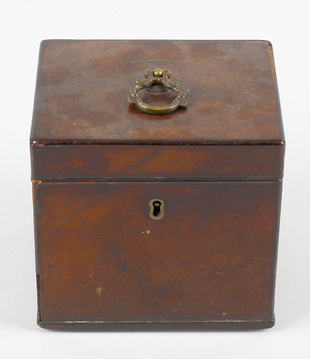 A George III mahogany tea caddy, of cuboid form, the hinged cover with scroll loop handle, 5 x 4 x 5