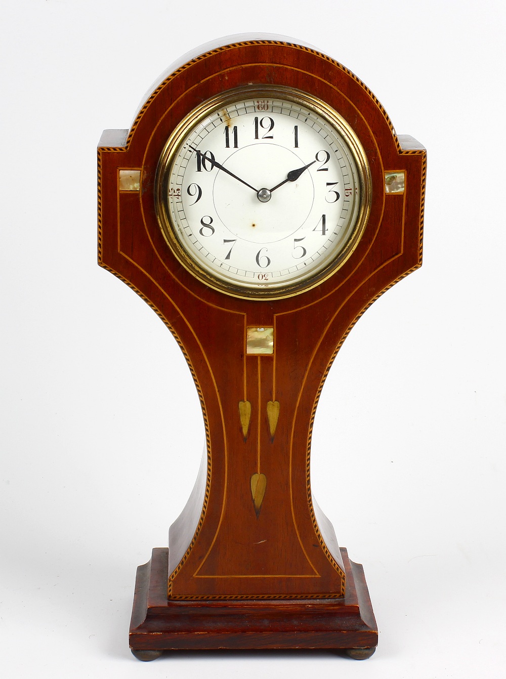 An Art Nouveau inlaid mahogany 'balloon' mantel clock. Having a 3.5-inch white Arabic dial, the